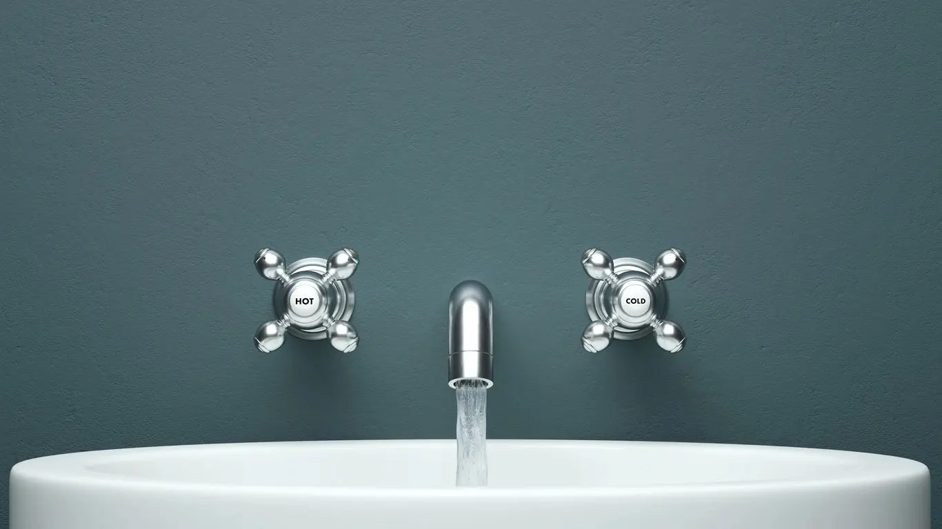 Bathroom sink with hot and cold taps.